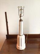 A white ceramic table lamp of two tiers with reeded sides (57cm to top of lampholder)