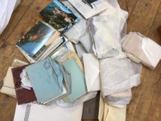 A box containing a large collection of postcards, some in albums etc.