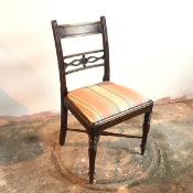 A Scottish Regency side chair with drop in upholstered seat, on turned supports with X stretcher (