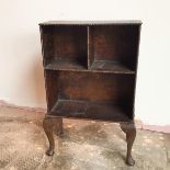 A neat 1920s bookcase, with two recesses above a single recess, with beaded edges, on cabriole