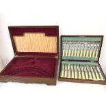 A 1930s/40s Walker & Hall cutlery canteen with a set of twelve bone handled knives and forks (6cm