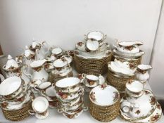 A large Royal Albert Old Country Rose dinner service including eighteen dinner plates (26cm), side