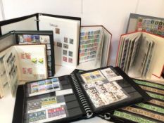 A large box containing stamps in prestige and various stock books with thousands on paper and in