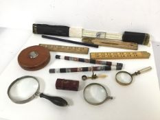 A collection of rulers, including, AW Faber, made in Bavaria, Lufkin Rule Co. tape measure,