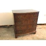 A mahogany Burton Reproductions Ltd. George III style bow front chest, fitted four drawers (one