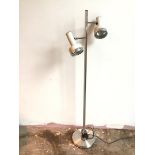 A modern metal standard lamp, the square stem with two arms, each with adjustable lamp with