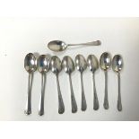 A set of nine 1921 Sheffield silver teaspoons, initialled M (combined: 207.53g)