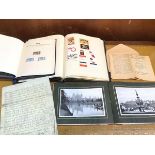 A mixed lot including a Coronation of King George VI stamp album with each page with stamps from