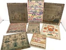 A group of 19th century and later needlework samplers, each mounted on board or stretcher