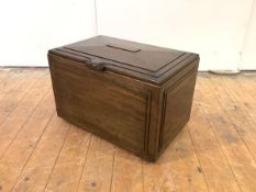 In the manner of Sir Robert Lorimer, an early 20th century walnut cellaret or log box by Whytock &