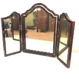 An early 20th century tortoise-shell veneered triptych dressing mirror. 66cm by 98cm