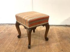 A mid-19th century rosewood stool, the upholstered seat raised on cabriole legs and scroll feet.