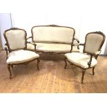 A three-piece giltwood salon suite, in the French taste, 20th century, to include a pair of