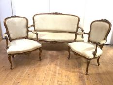 A three-piece giltwood salon suite, in the French taste, 20th century, to include a pair of