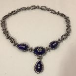 A striking vintage silver, enamel and paste necklace, hallmarked for London 1956, maker's mark
