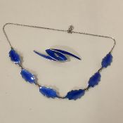 Karl Rasmussen, a Norwegian sterling silver and enamel necklace, of six leaf-shaped panels, in royal