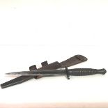 A World War II 3rd Pattern Fairbairn-Sykes 'B2' Commando fighting knife, the hilt with ribbed