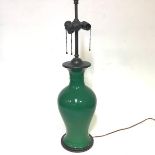 A large crackle glazed porcelain table lamp in the Chinese taste, of baluster form, green-glazed,