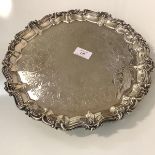 A Victorian silver salver, Joseph Angell II, London 1851, circular, the rim cast with scrolls and