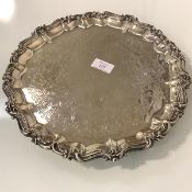 A Victorian silver salver, Joseph Angell II, London 1851, circular, the rim cast with scrolls and