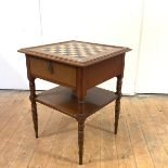 A late 19th century walnut and herringbone-banded games table, with chequerboard inlaid top and