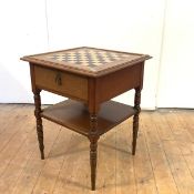 A late 19th century walnut and herringbone-banded games table, with chequerboard inlaid top and