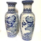 A pair of Chinese blue and white porcelain floor-standing baluster vases, 20th century, each