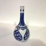 A Chinese blue and white vase of bottle form, probably 19th century, the neck painted with