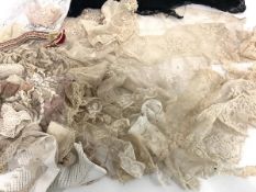 A group of 19th century lace, broderie anglaise and other trims including several collars, in