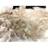 A group of 19th century lace, broderie anglaise and other trims including several collars, in