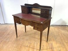 A late 19th century walnut and inlaid writing desk, the superstructure incorporating a mirror