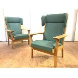 Hans Wegner, a pair of high back easy chairs, model GE-181, for Getama (Denmark), each pale oak