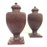 A pair of imposing faux porphyry urns, composition, 20th century. 46cm