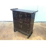 A Chinese elm and simulated elm table cabinet, the pagoda top above brass butterfly hinges and