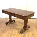 A mid-19th century rosewood centre table, the pair of frieze drawers with shell and scroll moulding,