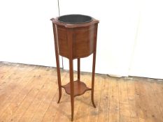 An Edwardian mahogany and boxwood inlaid jardiniere, of serpentine form, with detachable liner. 99cm