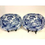 A pair of pearlware platters or ashets, c. 1820-30, Andrew Stevenson, in the Chinese Traders