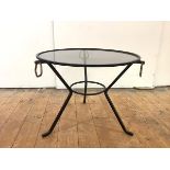 Jacques Adnet (French 1901-1984), a cast iron and brass occasional table, designed and executed