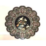 A striking Japanese cloisonne charger, c. 1900, of lobed circular form, the well decorated with