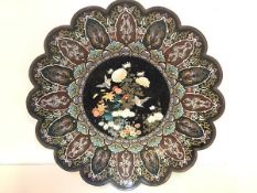 A striking Japanese cloisonne charger, c. 1900, of lobed circular form, the well decorated with