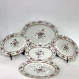A set of five early 19th century Derby porcelain graduated serving plates, each enamel polychrome