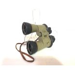 A pair of German World War II 7X50 Kriegsmarine U Boat binoculars, by Carl Zeiss, with green metal