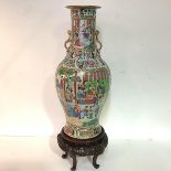 A large Chinese porcelain famille rose baluster vase, c. 1900, the elongated neck applied with