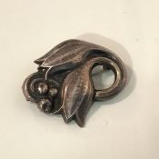 Georg Jensen, a sterling silver tulip brooch, with planished finish, stamped marks including 100A