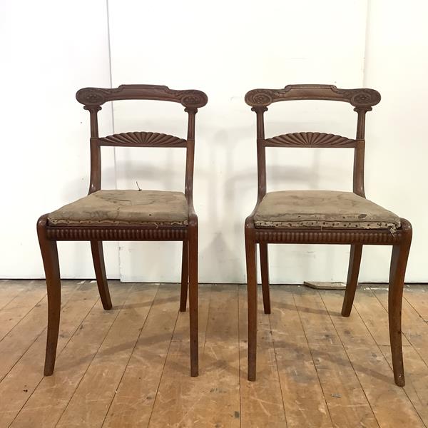 A good pair of Scottish Regency mahogany side chairs, c. 1820, each curved top rail with carved