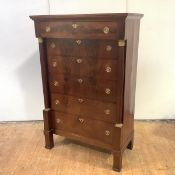 A French Empire Revival mahogany chest, c. 1900, of six graduated drawers, within turned columns and