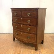 A Regency mahogany bowfront chest, c. 1810, probably Scottish, ebony lines and chequer banding,