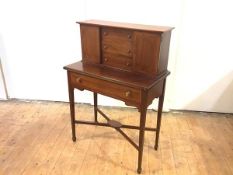 A late 19th century mahogany and satinwood-banded writing desk, the raised superstructure with