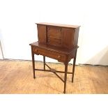 A late 19th century mahogany and satinwood-banded writing desk, the raised superstructure with
