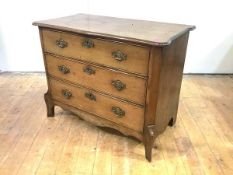 A 19th century French provincial oak chest of small proportions, with three graduated drawers on